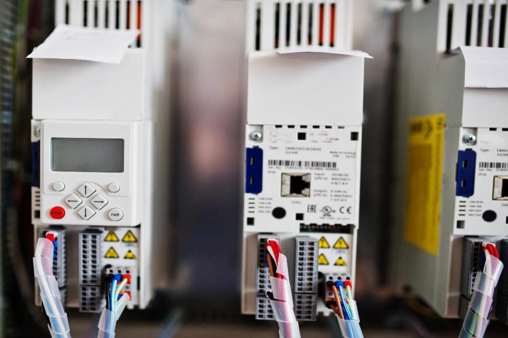 Variable frequency drive (VFD) controlling a commercial HVAC motor
